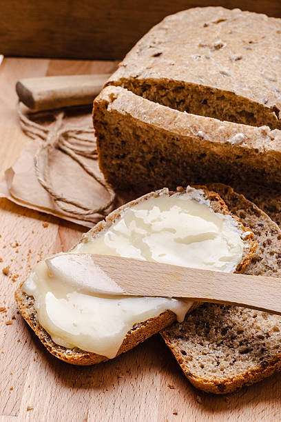 istock Still life fresh bread with butter and honey 475828164