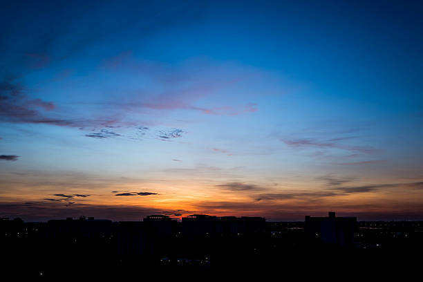 istock Silhouette rural town and sky in sunrise 475831042