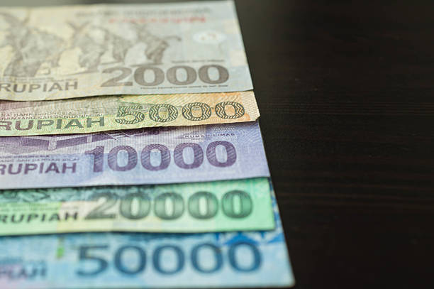 istock Some banknotes of Indonesian rupiah 475831166
