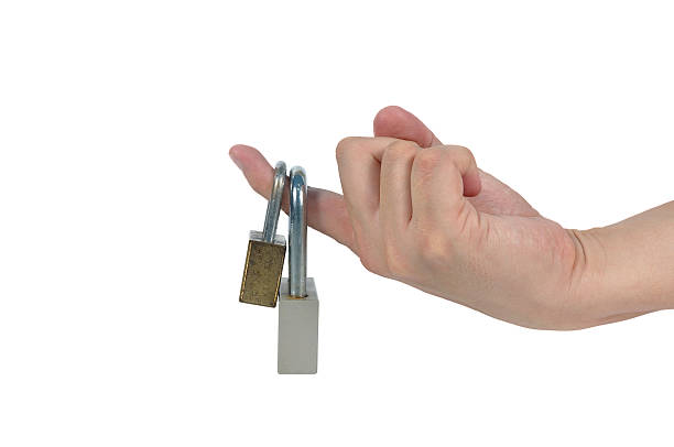 istock Man forefinger locked by padlock, Trigger-Finger health care bus 475831332