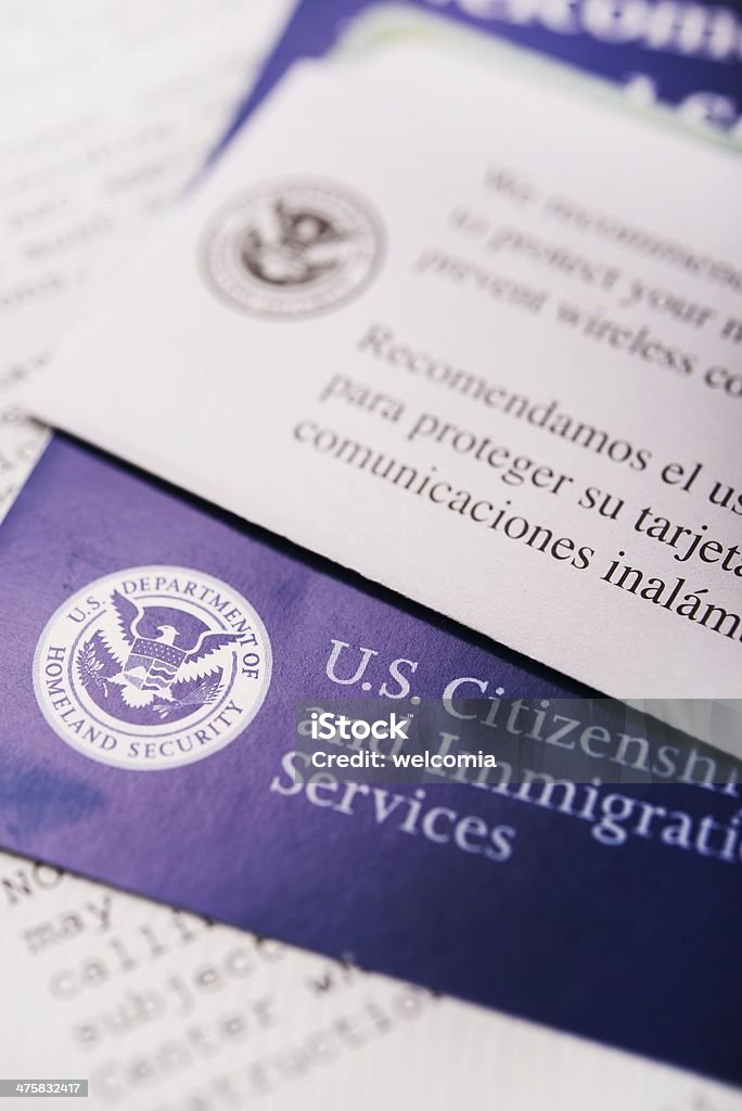 United States Citizenship United States Citizenship and Immigration Flyers and Documents Closeup. Emigration and Immigration Stock Photo