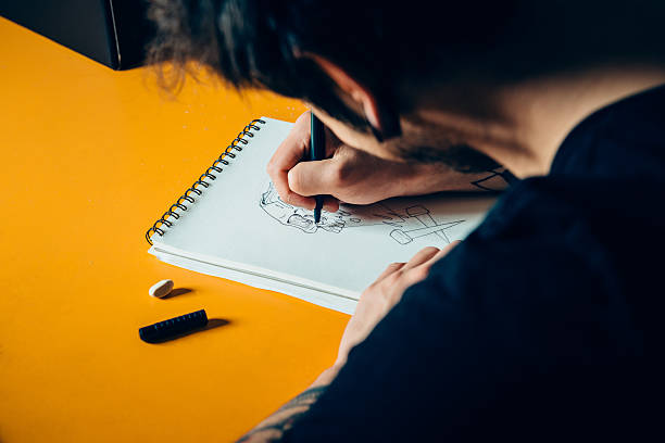 istock Tattoo Artist Drawing 475832818