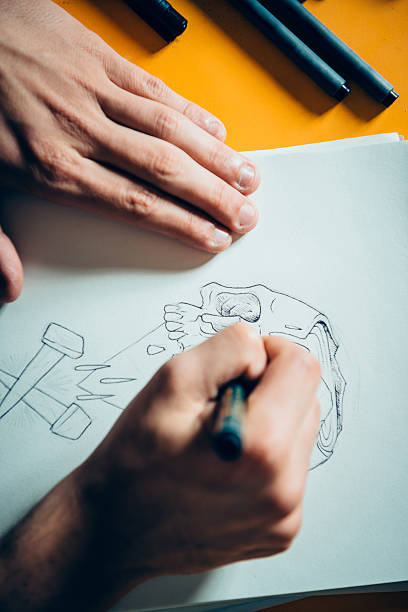 istock Tattoo Artist Drawing 475832844