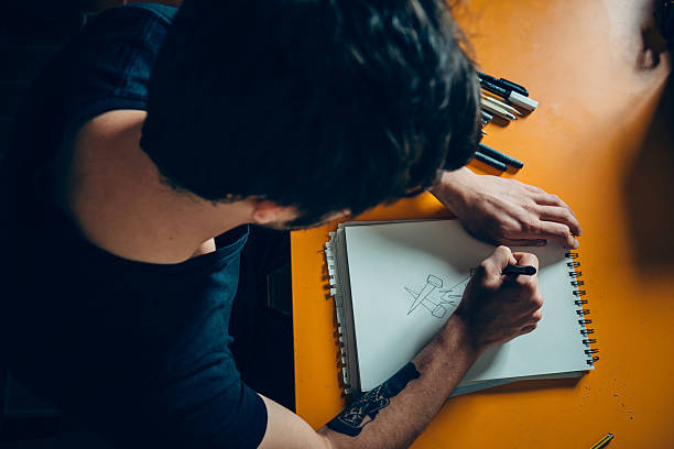 istock Tattoo Artist Drawing 475832854