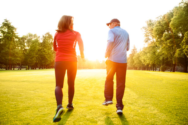 istock Mature couple running outdoors 475832872