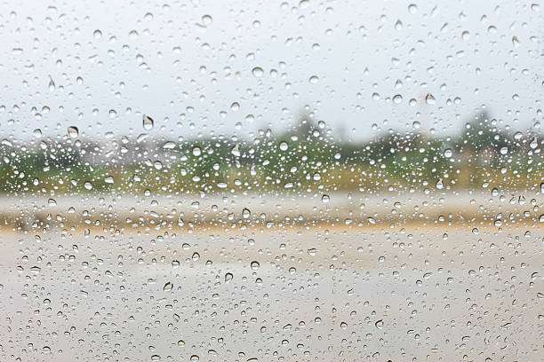 istock rain drop on the car glass in the rainy day 475833174