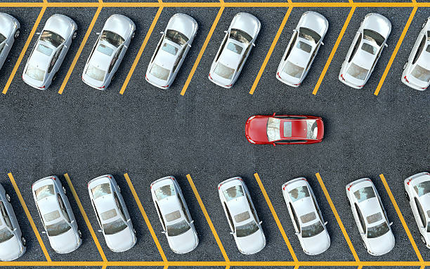 istock search for a parking space. Many cars parked 475833406