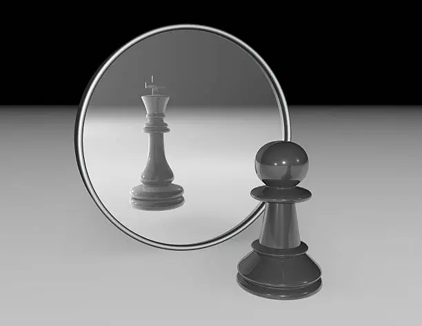 Ambition and dream abstract concept with chess pawn and reflexion of chess king in a mirror. Black and white illustration.