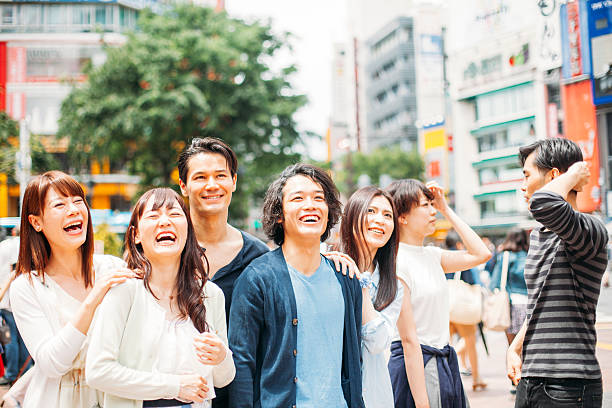 istock Young people  hanging out against cityscape 475835904