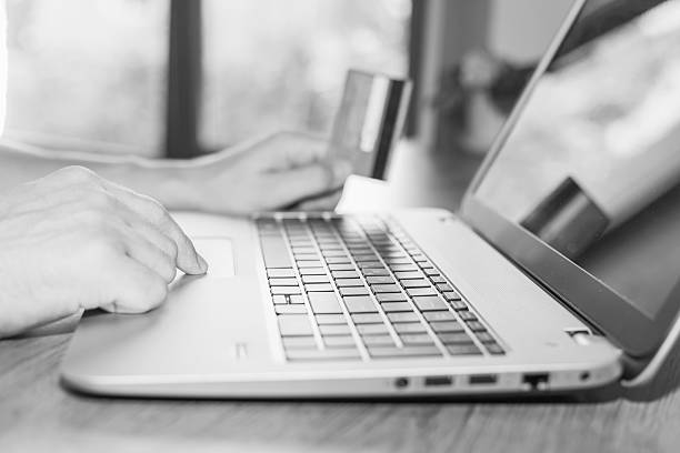 istock concept of online payment by plastic card through Internet Banking 475839052