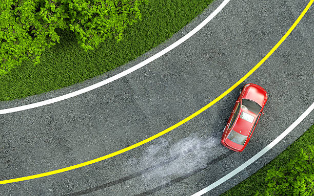red car enters the turn with skid. red car enters the turn with skid. brake stock pictures, royalty-free photos & images