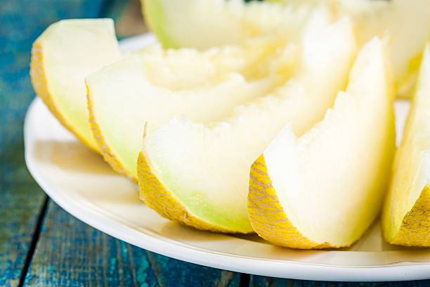 istock slices of fresh melon on a plate closeup 475843082