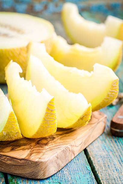 istock slices of fresh melon on cutting board 475843084