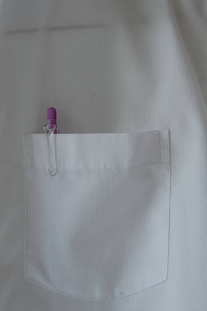 istock pen in white shirt pocket 475843250