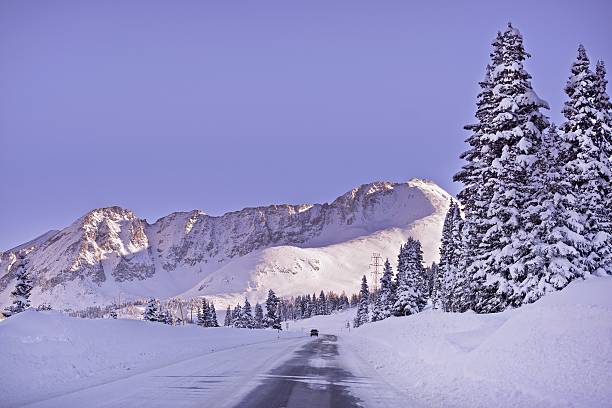 Colorado Winter Highway Colorado Winter Highway Under Fresh Snow. Road to Leadville, Colorado United States. leadville stock pictures, royalty-free photos & images