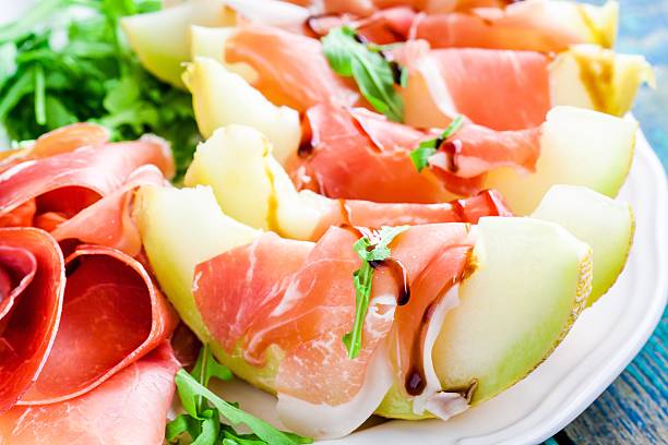 istock salad of melon with prosciutto, arugula and balsamic sauce 475846568