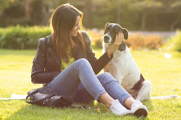 istock Woman with cute dog 475849634