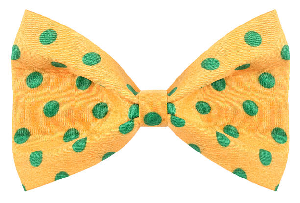 istock Hair bow tie yellow with green dots 475854222