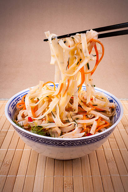 Rice noodle with chopsticks taken, close up