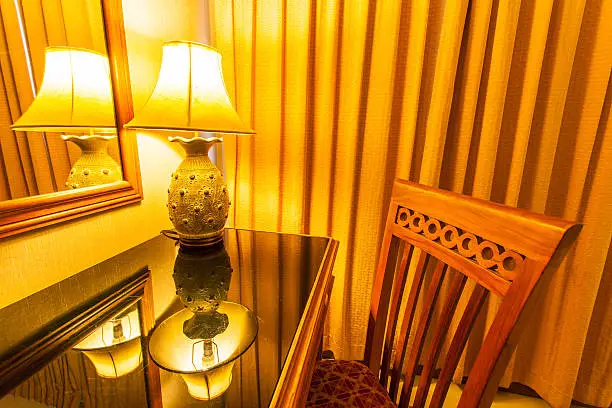 lamp on the table and chair in retro style