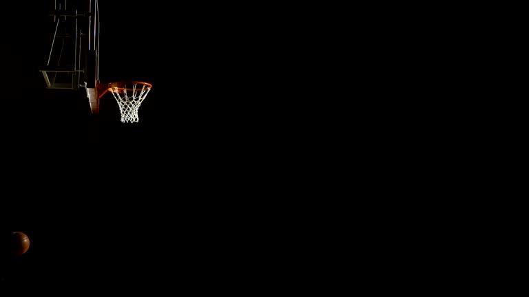 Player Performing A Slam Dunk (Super Slow Motion)