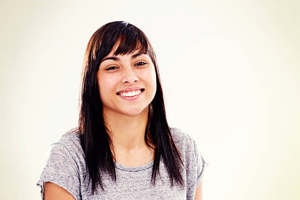 istock Pretty girl-next-door type smiling 475862921