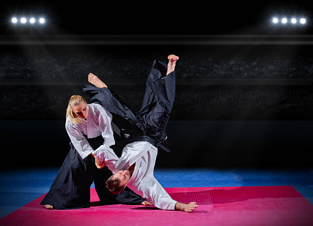 istock Fight between two martial arts fighters 475864312