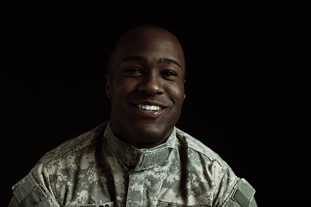 istock happy soldier with a big smile 475869184