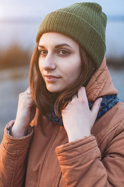 istock attractive girl in green hat 475869452
