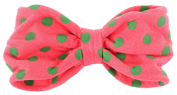 istock Hair bow tie pink with green dots 475869620