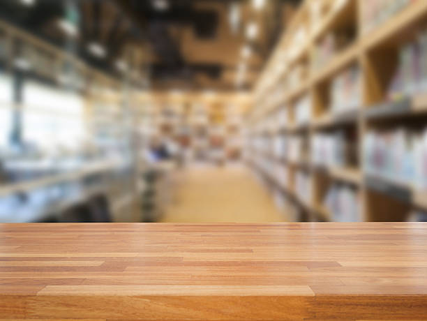 istock Empty wooden table and modern library background, product displa 475871698