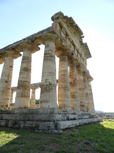Front of a Greek temple deteriorated by time. It was believed that the ceilings were made of wood and that is why they have not been preserved until today. Both the basement and the columns were built of stone stones perfectly fitted to represent the beauty of the divinities