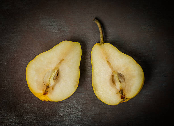 Sliced pear on two halves