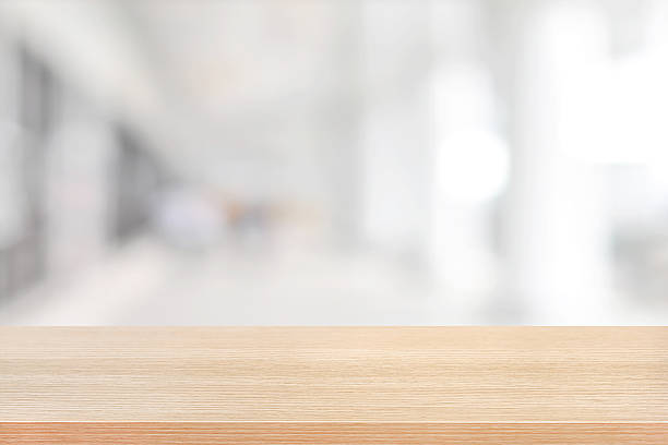 istock Wood table top on blurred white gray background 475879902