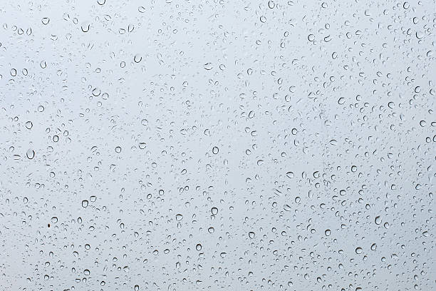 istock rain drop on the color glass in the rainy day 475883762