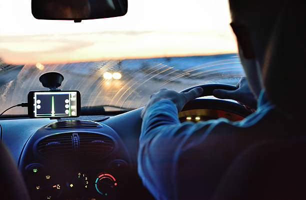 istock Behind the wheel rides a young man 475884564