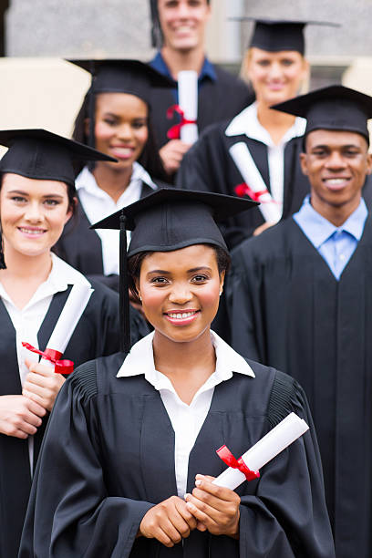 istock college students in graduation gown 475888185