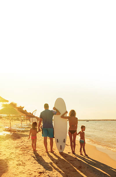 istock family on the beach 475888225