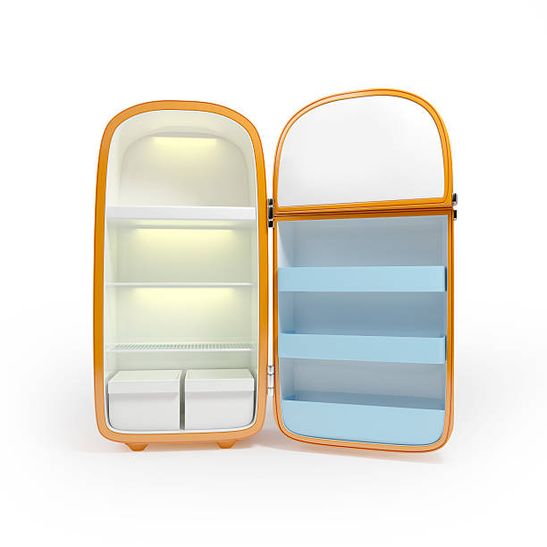 vintage fridge Retro orange refrigerator isolated on white background retro 1950s kitchen stock pictures, royalty-free photos & images