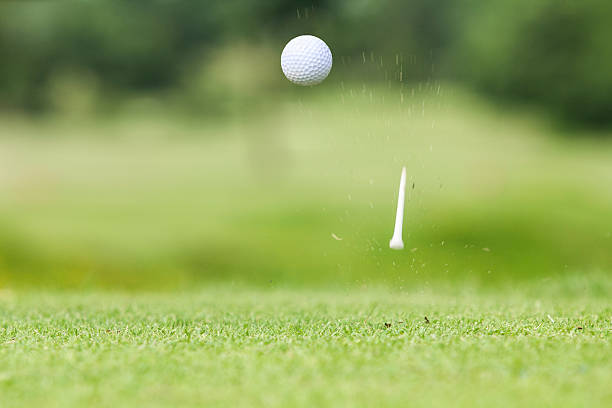 istock Golf ball just coming off the tee 475889180