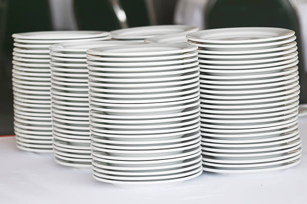 istock Group of white plates stacked together. 475893249