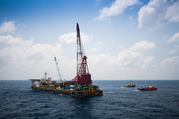 istock Large crane vessel installing the platform in offshore 475893891
