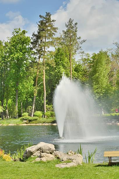 istock Fountain in the lake in the park 475896042
