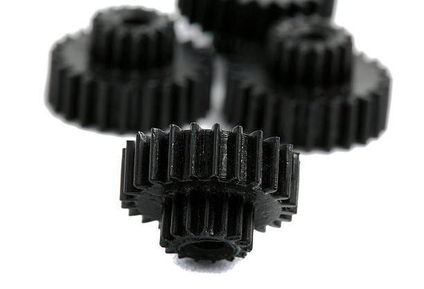 istock small gears photographed close up on a white background 475896678