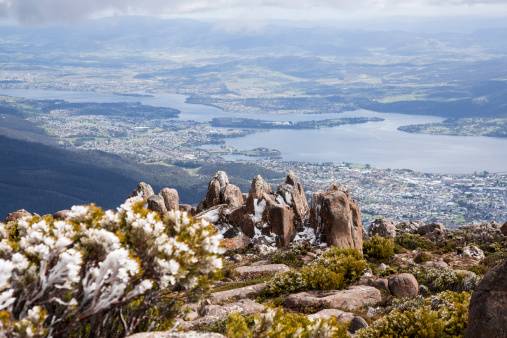 Mt Wellington Tasmania, also known as Kunanyi.  Hobart is at it foot, and on clear days the view is magnificent.  It is often freezing up on top of the Mountain.
