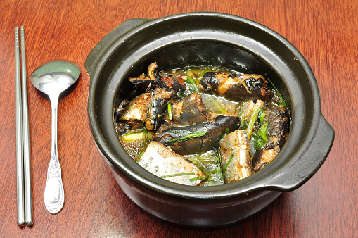 Braised fish in a bowl in Vietnamese meal
