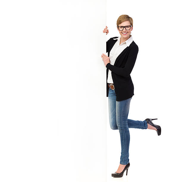 istock Smiling young woman with big banner 475897471