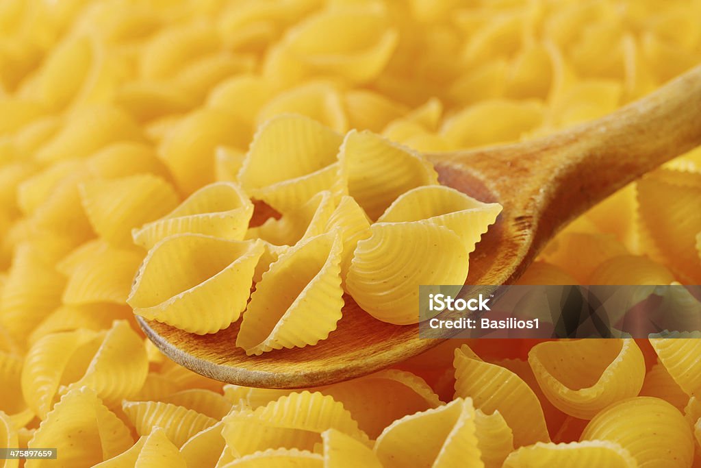 Amber textura de formato de conchas de massa - Foto de stock de Alimentação Saudável royalty-free