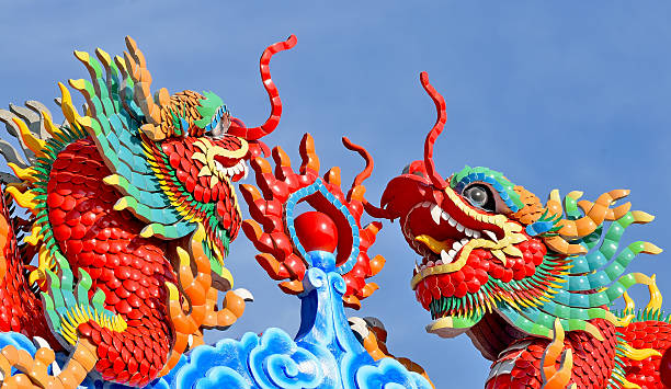 istock dragon statue on china temple roof 475897816