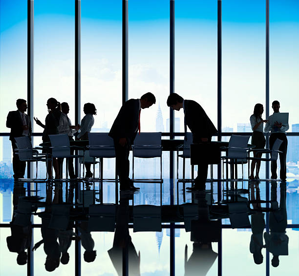 istock Japanese Business People Bowing Down Office Concept 475898568